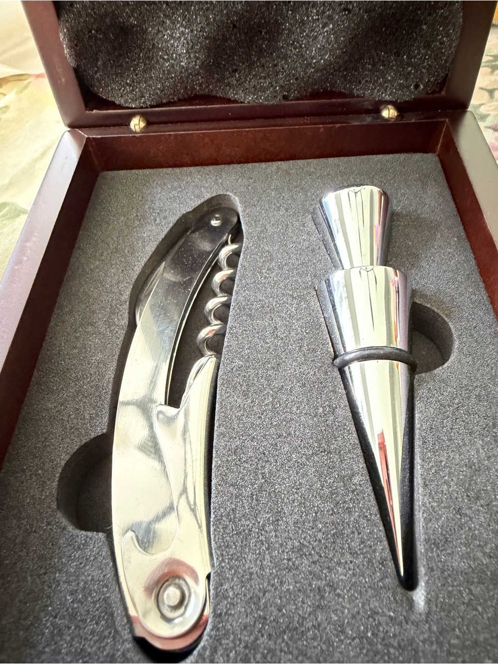 Wine travel set in rosewood box. Has brass plate on top. New never used
